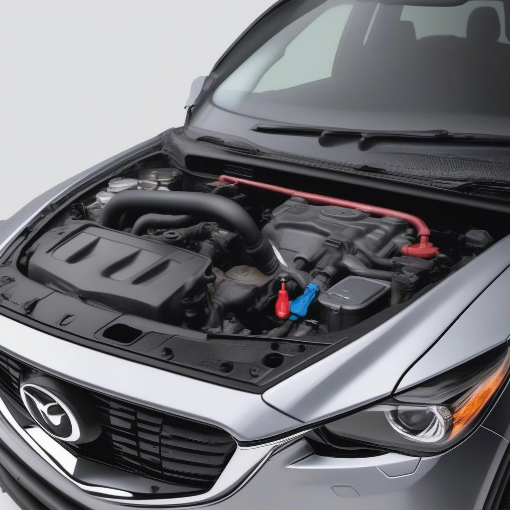 Kiểm tra dầu nhớt Mazda CX5 bằng que thăm dầu