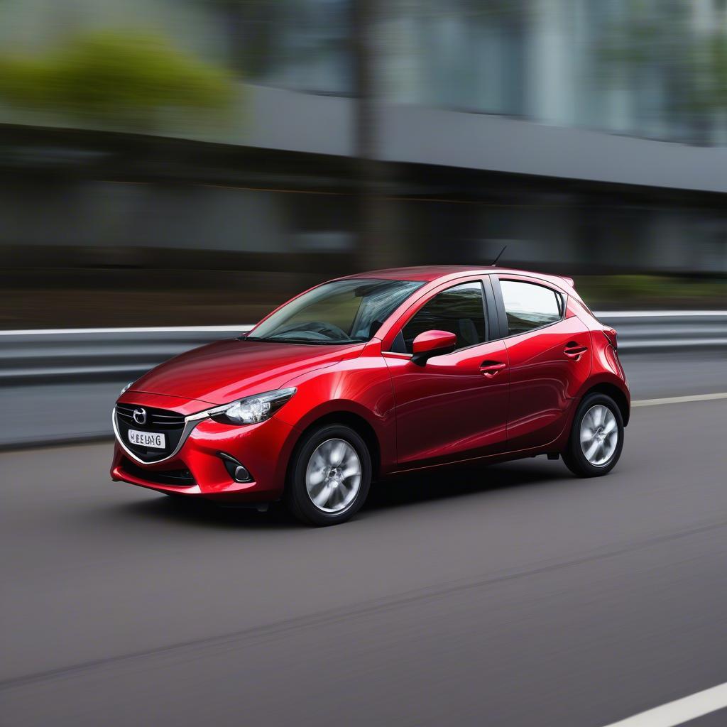 Mazda 2 2012 màu đỏ đang chạy trên đường