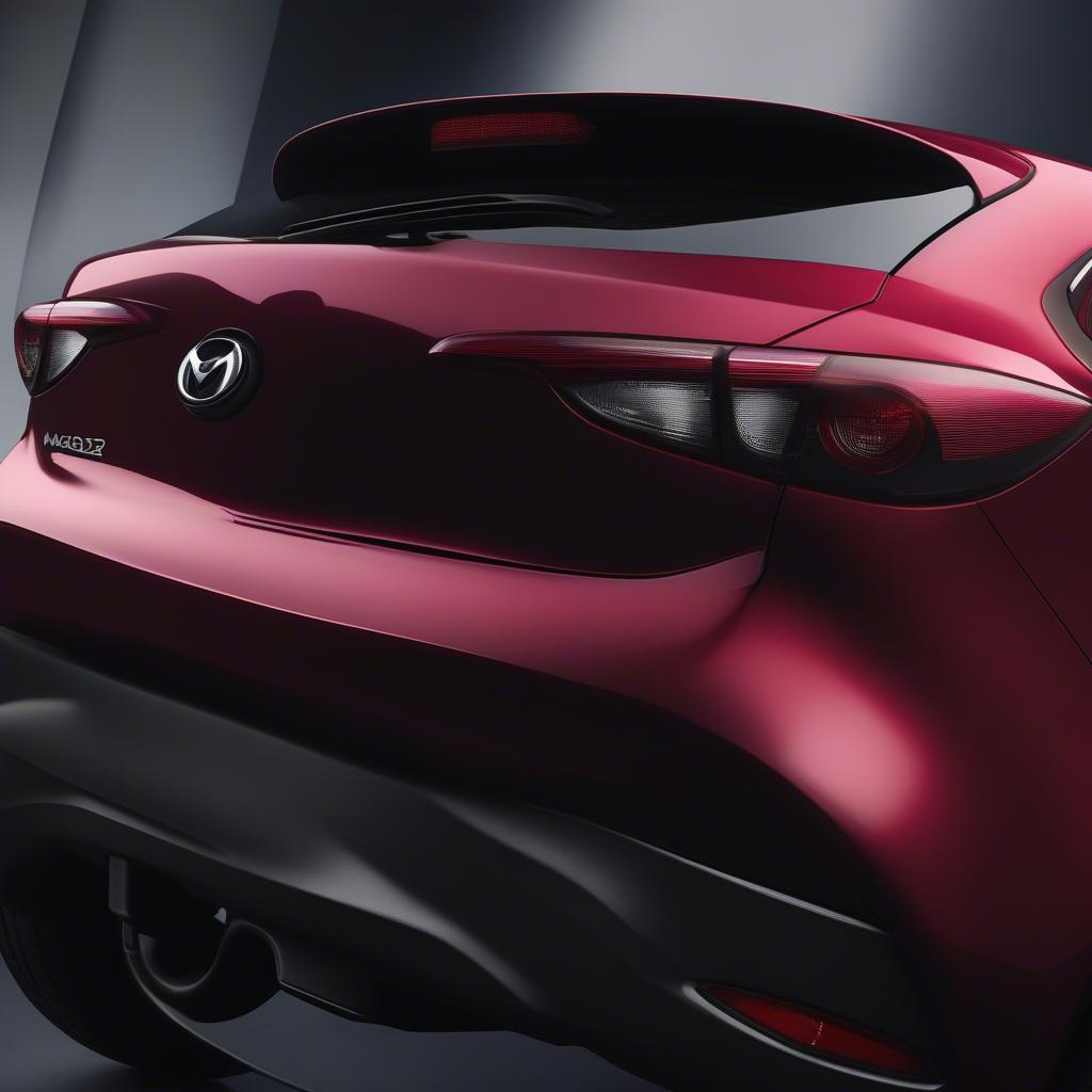 Mazda 2 đỏ đô với đuôi gió liền cốp