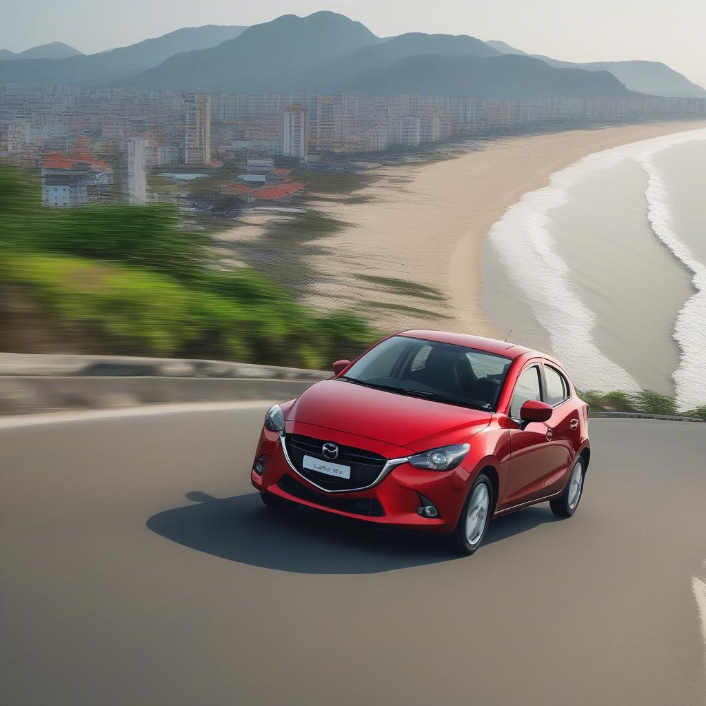 Mazda 2 Hatchback cũ Đà Nẵng - Hình ảnh chiếc xe màu đỏ đang di chuyển trên đường phố Đà Nẵng